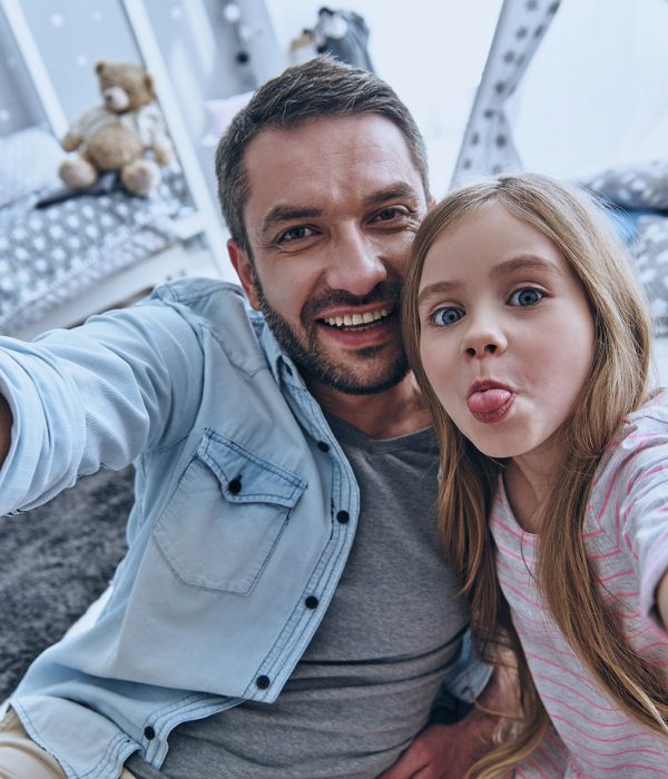 Happy Man And Daughter Experiencing Relief From Brain Fog