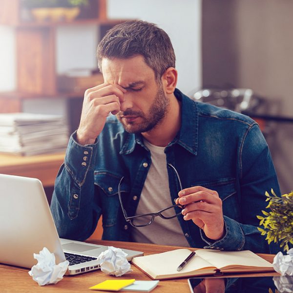 Man Suffering From Brain Fog And Mental Fatigue